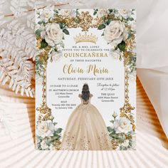 an elegant quinceauera birthday party with white roses and gold trimmings