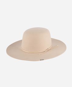 Rue is a sophisticated, classic open crown shape with a structured semi-wide brim. This is the only hat featuring hand-stitched detailing on the brim's edge for a subtle, distinctive touch. Included is a tonal triple-strand waxed leather band that is both adjustable + removable for styling. Classic Unlined Hat With Curved Brim, Classic Wide Brim Top Hat For Spring, Classic Unlined Flat Brim Fedora, Elegant Unlined Hats With Short Brim, Elegant Hats With Short Brim, Elegant Hats With Short Brim Unlined, Elegant Short Brim Unlined Hat, Classic Spring Hat With Flat Crown, Classic Unlined Hat With Flat Brim