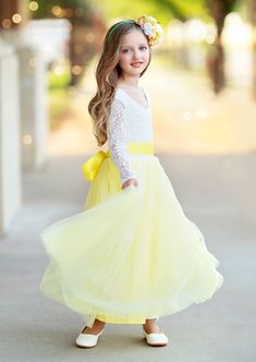 Dress your little princess in a magical Yellow Fairytale Flower Girl Dress complete with delicate tulle and lace. Perfect for a Disney Princess wedding enchantment. Perfect for Spring through Fall weddings. How to Order: Dresses are true to size. Please measure to ensure best fit. *Select your preferred sash style and then leave the sash color in the cart notes at checkout. Additional Options: We offer an array of adorable wedding bridal sashes and bridal headbands accentuate your beautiful Hann Flower Girl Dress With Sleeves, Flower Girl Hair Bows, Yellow Flower Girl Dresses, Disney Princess Wedding, Bridal Headbands, Wedding Themes Summer, Hannah Rose, Flower Girl Shoes, Lavender Green