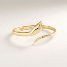 Here's the Stylish Snake Stacking Ring by Christo! Our 14K Solid Gold Spiral Open Ring is perfect Stackable and Daily Spiral Open Ring for Girls. This Minimalist Index Finger Cuff Ring is designed as Premium Chick Index Finger Ring and 18K Knuckle Ring for her. This Dainty Stacked Ring is perfect Daily wear Ring as a Everyday Simple Ring design for women.  Our Stackable Wrapped Knuckle Band is perfect Motherly Gift Jewelry for mother, wife and mom. This Stylish Minimalist Cuff Ring is also great Minimalist Snake Ring For Anniversary, Minimalist Adjustable 14k Gold Bypass Ring, Adjustable 14k Gold Minimalist Bypass Ring, Unique Brass Stackable Open Rings, Adjustable Minimalist Snake Ring, Gold Open Snake Ring, Minimalist Adjustable Snake Shape Rings, Minimalist Adjustable Open Snake Ring, Gold Spiral Minimalist Stackable Rings