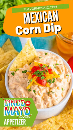 the mexican corn dip is served in a bowl with tortilla chips on the side