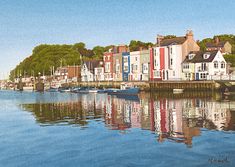 there are many boats that are in the water near houses and buildings on the shore