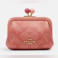 This Coach Coin Case In Signature Canvas Is Perfect For Organizing Your Cards And Coins. The Beautiful Im/Candy Pink Color And Canvas Fabric Make It A Stylish Addition To Any Accessory Collection. It Is Designed For Women And Features A Kisslock Closure For Added Security. This Item Is Ideal For Those Who Love Coach Products And Want To Keep Their Cards And Coins Organized In A Fashionable Way. In Pristine Condition Product Details Signature Coated Canvas And Smooth Leather Kisslock Closure, Fab Pink Coach Bag As Gift, Chic Pink Coin Purse For Everyday Use, Coach Clutch Wallets For Gifts, Chic Pink Coin Purse, Chic Pink Coin Purse For Everyday, Compact Coach Wallet As Gift, Coach Rectangular Wallets As Gift, Trendy Pink Coach Wallet, Chic Compact Pink Wallet