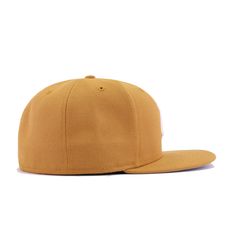 New Era Cap 59Fifty fitted hat for the New York Yankees in custom tan colorway, highlighted by interlocking NY logo on its front. This fitted from Hat Heaven features the ever-popular Panama Tan color, perfect for matching construction boots. With a clean front logo in Snow White, this simple custom goes a long way, fitting nicely with any wardrobe. With the rising trend in wearing earthy colors, this custom from Hat Heaven is a great addition to your collection. Hat Material: 100% PolyesterCrow Construction Boots, World Baseball Classic, San Diego Chargers, New Era Cap, Oakland Athletics, New Era 59fifty, Earthy Colors, New York Jets, Philadelphia Phillies