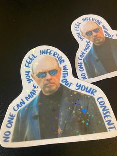 two stickers with the image of an older man wearing sunglasses and one has glasses on his head