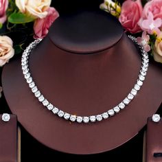 Add a touch of elegance to your special event with this stunning Cubic Zirconia Necklace and Earrings Set.
– This bridal a plus cubic zirconia gemstone necklace set is perfect for adding elegance to any bridal ensemble. – Made with high-quality materials, this set includes a stunning necklace and matching earrings for a complete look. – Perfect for pageant, bridal, bridesmaid, prom, quinceañera or special occasion. Zirconia Necklace, Diamond Alternatives, Cubic Zirconia Necklace, Prom Jewelry, Necklace And Earrings Set, Ideal Wedding, Stunning Necklace, Necklace And Earrings, A Plus