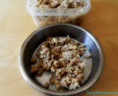 two bowls with food in them sitting on a table