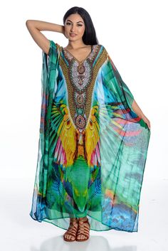 "African Kaftan For Women, Kaftan, Plus Size Clothing Kaftan dresses can also act as perfect beach cover-ups. Easy and breezy, these multicolored Kaftans accentuate your look. Whether its beach party or a holiday trip, you can wear a kaftan dress anytime to look good on all occasions. This gorgeous, green feather Caftan, with beautifully embellished details is the right outfit for a casual date, a stroll by the beach, by the poolside, or just about anywhere. Colors are vibrant and beautiful !! Beach Kaftan Dress, Kaftan Style Dresses, Style Dress Patterns, Kaftan Pattern, Chiffon Kaftan, Kaftan For Women, Beach Caftan, Kaftan Dresses, Green Feather