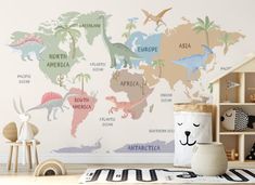 a child's room with a map of the world painted on the wall