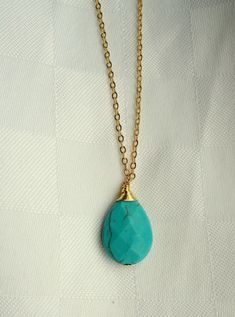 "Gold and turquoise necklace, Turquoise teardrop necklace, Gemstone necklace, December birthstone necklace A lovely faceted teardrop turquoise howlite pendant hangs elegantly from quality gold plated chain. Turquoise stones have their own unique markings and may differ slightly than the picture. The length of the necklace measures approximately 18\" (46cm) Every item from Gemma Jolee comes packaged ready for gift giving. Please contact me if you have any questions. Thanks for looking. To view ot December Birthstone Necklace, Turquoise Howlite, Teardrop Necklace, Necklace Gemstone, Valentines Gift, Delicate Necklace, Birthstone Necklace, Gold Plated Chains, Turquoise Stone