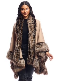 Lush, lavish Tipped Fox in a warm palette of rich Browns, elevated by Ivory, Tan and Taupe tipping, borders this incredibly versatile Camel knit shawl. Fluid, distinctive and voluminous, you'll love wrapping the Fur-Trimmed Shawl over suits, pants and dresses. Supple yet stable, a touch of Spandex ensures both stretch and recovery. Measuring a generous 51" across and 26" at center back, it's the cozy layer of luxury that drapes in a multitude of ways. Perfect for Fall weather, it's that extra layer that you'll add on the first cool days. Easy elegance personified, come Winter, you'll enjoy it indoors and outdoors as well, as a coat-topper! Beige Wool Shawl For Fall, Fall Beige Wool Shawl, Winter Beige Wool Shawl, Beige Wool Winter Shawl, Beige Wool Shawl For Winter, Beige Cape Shawl For Fall, Elegant One-size Beige Outerwear, Winter Wool Shawl, Brown Wool Shawl For Winter