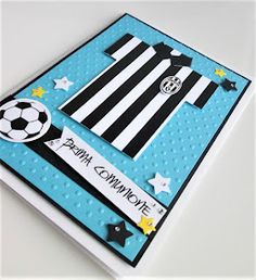 a card with a soccer jersey on it and stars around the edges that says congratulations