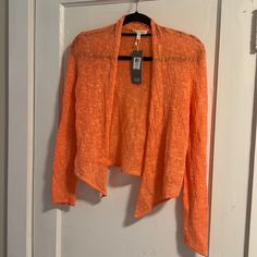 Gorgeous Light Slub Linen/Cotton Blend Open Cardigan. Slight Shawl Collar, Pointed Hem-You Can Tie Or Tuck Or Leave Open! Beautiful Coral Orange, Not Neon At All. Marked Xs. New With Tags. No Flaws. Spring Sweater For Layering, Open Knit Top With Open Front For Spring, Spring Open Front Sweater For Layering, Open Front Sweater For Spring Layering, Spring Open Front Sweater For Daywear, Black And White Tweed, Zippered Cardigan, Cropped Cardigan Sweater, Merino Wool Cardigan