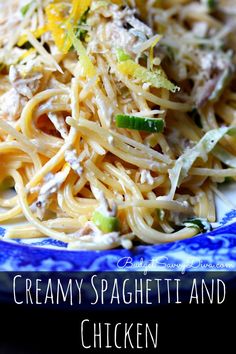 a blue and white plate topped with pasta and vegetables next to a text overlay that reads creamy spaghetti and chicken