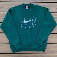 Rare Vintage Early 90s Nike Air Forest Green Sweatshirt Made In Usa Big Nike Air Embroidery In White Across Chest Leather Nike Check Size Large In Amazing Condition No Flaws To Note From A Smoke Free Home 90s Vintage Sweatshirts, Nike Embroidery Sweatshirt, 90s Nike, Green Sweatshirt, Embroidery Sweatshirt, Early 90s, Fall Fits, Nike Green, Nike Shirts