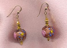 "Vintage Italian Wedding Cake Beads, Crystal Clear Fiorato, Murano Glass Earrings, handmade with 14mm Round, Venetian Beads. These detailed Italian, lamp worked beads are made with crystal clear colored Murano glass, Aventurina (copper), pink \"roses\", and blue and yellow \"forget-me-knots\". Some people refer to these beads as \"wedding cake\" beads; but the Italians call these beads \"Fiorato\" (flowered). I refer to them as Antique Fiorato. The crystal clear dangle earrings are shown in the Elegant Round Beaded Earrings With Spacer Beads, Elegant Beaded Earrings With Bead Caps, Wedding Beaded Earrings With Round Beads, Gold Beaded Round Earrings, Round Beaded Earrings For Wedding, Elegant Czech Glass Round Beaded Earrings, Elegant Round Czech Glass Beaded Earrings, Gold Earrings With Czech Glass And Spacer Beads, Elegant Round Beaded Earrings With Czech Glass