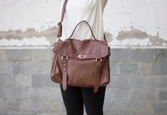 "Brown leather satchel made from 100% Genuine Italian cowhide distressed leather Finally a women's messenger bag that imparts femininity , made from soft leather and designed with a classy and sophisticated way.Designed for working women and students that need to carry paperwork , laptop , chargers etc in a stylish handbag. F E A T U R E S --- EXTERIOR ---- -Available in 2 sizes for a 15\" laptop or a 13\" laptop size ( choose from the dropdown menu ) -Adjustable / detachable cross body shoulder Laptop Size, Messenger Bag Leather, Womens Messenger Bag, Brown Leather Satchel, Working Women, Vintage Leather Bag, Leather Laptop Bag, Leather Briefcase, Working Woman