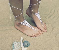 PearlWhite Crochet Barefoot SandalsMade with 100% cotton yarn.featured on Freepeople.com and in stores.Perfect for the beach this summer. They look great  on bare feet or even under sandals.Handmade Crochet Barefoot Sandals/Foot ThongsPerfect bridal accessory for an outdoor wedding!*Ask about other colors or custom orders!!!The pictures show varigated thread I currently can make any style sandal. Please put it in your notes when you purchase the style you want.Check out this link for more colors Crochet Barefoot Sandals, Jewelry Hippie, Body Adornment, Beach Bride, Animal Hats, Beach Accessories, White Crochet, Crochet Accessories, Beach Jewelry