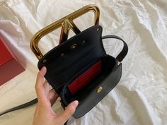 Size: 18cm*7.5cm*12.5cm It comes with Dust box, Care manual, Tag, and Paper bag. High-end Gold-tone Pouch Box Bag, High-end Pouch Bag For Gift, High-end Box Bag With Gold-tone Hardware, High-end Daily Use Pouch Box Bag, High-end Black Shoulder Bag For Gift, Designer Top Handle Pouch For Gift, High-end Crossbody Shoulder Bag For Gift, High-end Bags With Detachable Handle For Gift, Rectangular Pouch With Detachable Handle For Shopping