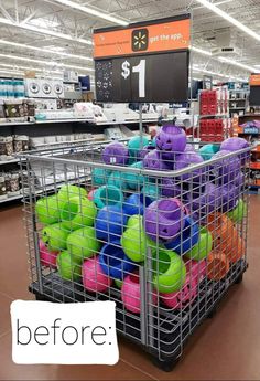 a shopping cart filled with lots of colorful balls in a grocery store's aisle