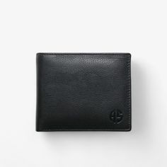 This compact black RFID leather wallet is designed for men who value convenience without compromising on quality. Made from premium calf leather, it offers a sleek and minimalistic look while ensuring your essentials are well organized. Its practical size allows for easy storage in your pocket, making it perfect for everyday use. With built-in RFID-blocking technology, this wallet protects your credit and debit cards from unauthorized scanning, providing added security in crowded places. Key Fea Classic Black Trifold Wallet For Everyday Carry, Classic Black Trifold Wallet For Daily Use, Classic Black Trifold Wallet For Everyday, Black Leather Trifold Wallet For Everyday, Black Rfid Blocking Wallet For Business, Black Leather Trifold Wallet For Business, Black Leather Wallet With Rfid Blocking, Modern Black Trifold Wallet For Everyday Use, Minimalist Black Wallet With Coin Pocket