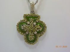 "Vintage green enamel & rhinestone shamrock pendant necklace. 16\" chain with spring ring fastener. Pendant including bale is 2 1/4\" x 1 1/2\". Green enamel, silver tone flowers, and clear rhinestones adorn this sweet pendant. Excellent condition." Green Rhinestone Necklace For Gift, Green Necklaces With Rhinestones As Gift, Green Enamel Necklace With Large Pendant, Giraffe Ring, Funky Necklace, Blue Beaded Necklace, Green Enamel, Glass Bead Necklace, Vintage Crystal