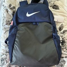 Brand New Navy Blue Usa Backpack Unused With Original Tags Sporty Navy Standard Backpack, Nike Standard Backpack, Nike Backpack For Daily Use Back To School, Nike Black Backpack For Daily Use, Nike Backpack For Back To School, Nike Student Backpack, Nike Backpack For Travel And Back To School, Nike Travel Backpack With Adjustable Strap, Navy Rectangular School Bag