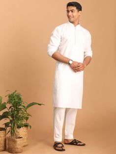 Vastramay Men's White Cotton Blend Solid Kurta with White Pant Set A classic choice for any occasion, this kurta and pant set from Vastramay is crafted from comfortable cotton blend fabric. The kurta features a solid white design, making it versatile and easy to style. Pair it with the included white pants for a complete traditional look. Features: Comfortable cotton blend fabric Solid white design Includes white pants for a complete look Specifications: Brand: VASTRAMAY Color: White Material: C Unstitched Casual Cotton Lawn Suit, Casual Cotton Traditional Wear For Eid, White Cotton Kurta With Relaxed Fit, White Cotton Relaxed Fit Kurta, White Relaxed Fit Cotton Kurta, Traditional Fit Cotton Straight Kurta, Festive Cotton Kurta With Straight Pants, Casual White Cotton Lawn Suit, White Cotton Sets With Straight Pants