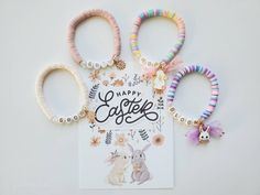 four different bracelets and a card on a white background with the words happy easter