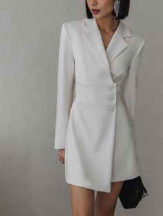 This sleek mini blazer dress is tailored from sturdy suit fabric in a single-breasted silhouette. Structured with powerful shoulders and generous lapels it falls to a flared hem and has an asymmetric chunky button front.- mini-length hem- slightly close fit- single-breasted silhouette- long sleeves- A-line hem- button fastening Formal Wrap Dress, Mini Blazer, Wrap Mini Dress, Classic Style Women, Online Fashion Store, Swimwear Shorts, Suit Fabric, Denim Jackets, Mini Wrap Dress