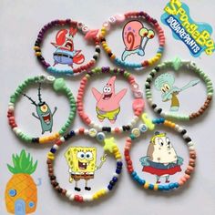 several bracelets with cartoon characters on them