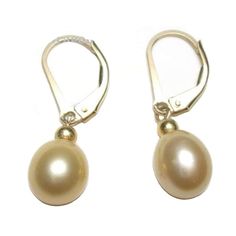 Gorgeous genuine golden pearl lever back earrings.      Pearl: top quality AAA grade genuine fresh water golden pearls      Pearl shape: tear drop      Pearl measurement: 8-9mm in diameter and 9-10 mm in length      Luster: high     Pearl color:  golden (color treated)     Metal: variable: 14K solid yellow gold, 14K solid white gold, gold filled or 925 sterling silver      Earring measurement: 1" including the lever back  Actual pearls may vary slightly. Classic Teardrop Pearl Earrings With Lever Back, Classic Gold Hypoallergenic Pearl Earrings, Classic Gold Pear-shaped Pearl Earrings, Gold Hypoallergenic Pearl Earrings For Formal Occasions, Gold Pearl Lever Back Earrings For Formal Events, Classic Pear-shaped Gold Pearl Earrings, Classic Pearl Earrings With Lever Back, Classic Oval Pearl Earrings With Ear Wire, Classic Pear-shaped Earrings With Lever Back