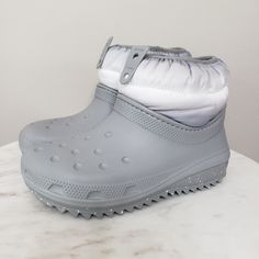 Nwt Crocs Classic Neo Puff Shorty Boot In Light Gray, White. Featuring Closed Heel, Sawtooth Rubber Outsole For Added Traction, And Fully Lined 400g Insulated Shaft. Style 207311-00j Shoes Crocs, Weatherproof Boots, Rain Boots Women, Yellow Boots, Boot Pulls, Faux Suede Boots, Womens Rain Boots, Women's Crocs, Black Chelsea Boots