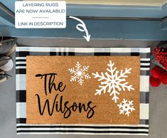 a door mat that says the wisconsins on it and snowflakes around it