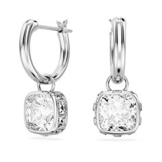 These radiant Stilla earrings are a perfect example of simple sophistication. Each rhodium plated piece features a clear facetted Swarovski Zirconia surrounded by clear square crystals hanging from a crystallized mini hoop. Effortless elegance. Article no.: 5662919 Collection: Stilla Color: White Size: 0.79 x 0.31 inch Material: Crystals, Rhodium plated, Zirconia Weight (individual piece): 0.07 oz Crystals Hanging, Dangle Hoop Earrings, Swarovski Stones, Square Earrings, Swarovski Earrings, Swarovski Jewelry, Mirror Work, Square Cut, Accessories Jewelry Earrings