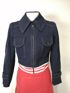 In amazing vintage condition this spring jacket, can be wear also as a jumper. Zip on the front, in blue red and white, tipycal sailor colour It is a very small size, good for petite measure shoulder  36 cm bust 44  cm lenght: 48  cm All items are pre-worn, vintage and may show some signs of aging. They are not brand new. All items are sold as-is and we do not accept returns. Please be sure the measurements listed are a good fit for you Navy Fitted Collared Outerwear, Retro Navy Outerwear With Long Sleeves, Navy Preppy Long Sleeve Outerwear, Preppy Fitted Blue Outerwear, Vintage Long Sleeve Cropped Jacket For Work, Navy Vintage Outerwear For Work, Navy Fitted Preppy Outerwear, Vintage Navy Outerwear For Work, Navy Fitted Retro Outerwear