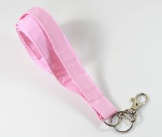 This cute lanyard has beautiful pink. This lanyard is very beautiful in person. You can have a wardrobe of lanyard to match your outfit. This lanyard is made of soft 100% cotton fabric to give a comfortable feel around your neck. This lanyard is easy to take care. You can spot clean and throw in a washer and hang dry. If you want you can iron and it is ready to use. These lanyards are perfect if you have metal allergy. Each of these lanyards will have a slight different pattern depending on wher Lanyard Pink, Cute Lanyard, Pink Plain, Cute Lanyards, Fabric Lanyard, Plain Fabric, Dark And Light, Have Metal, Hanging Dryer