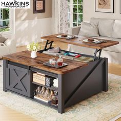 two coffee tables sitting on top of a rug in a living room