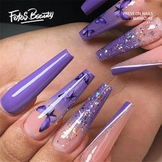 purple nails with bows and glitters on them are the perfect manicure for long nails