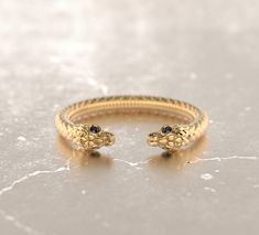 Fab and Sophisticated snake band in Bohemian Chic style. The snake texture inspired by mystical alchemical Ouroboros snake, which is one of the traditional infinity symbols. It has comfort fit and you won't want to take it off! About this item: -Black diamonds 0.03 approx. total carat weight -Stackable -Solid 10K Rose, Yellow or White gold OR -Solid 14K Rose, Yellow or White gold OR -Solid 18K Rose, Yellow or White gold OR -Platinum PLEASE NOTICE: This price is for the ring's sizes up to 8, if y Bohemian Chic Style, Snake Texture, Bohemian Goth, Ouroboros Snake, Serpent Ring, Bohemian Chic Fashion, Snake Jewelry, Symbolic Jewelry, Textured Ring