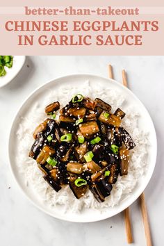 a white plate topped with eggplant and rice