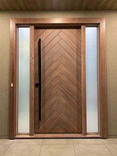 a modern wooden door with glass panels