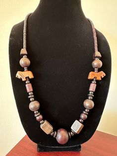 28 inch wooden geometric bead necklace with 2 carved lion beads. Good condition Columbia Tn, Beaded Necklaces, Bead Necklace, Black Men, Columbia, Lion, Etsy Accessories, Beaded Necklace, Jewelry Necklaces