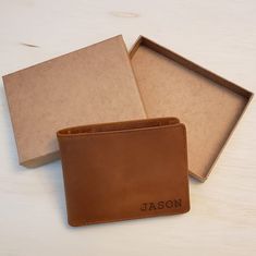 "This personalized leather wallet makes a great gift for any man in your life. It is made out of the highest quality full grain leather. Delight your loved one with an engraved wallet they'll carry with them everywhere! Or treat yo' self! The leather will soften naturally with wear and will age beautifully over time. It also features built-in RFID blocking technology for security. The bifold wallet can be customized with an engraving to make it the perfect personalized gift 😊 Engraving: Choose Personalized Mens Wallet, Personalized Leather Wallet, Engraved Wallet, Leather Anniversary, Leather Supplies, Mens Wallet, Mens Anniversary Gifts, Leather Man, Personalised Gifts For Him