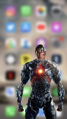 an image of a man that is standing in front of a cell phone with many app icons on it