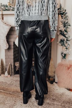 - These faux leather pants are cool, chic, and unique! - Unlined faux leather material - An adjustable, elastic cord drawstring waistline - A faux zip fly accent - Functional side pockets and back pockets - A relaxed silhouette that ends in ankle length drawstring hemlines Leather Button Up, Tweed Top, Faux Leather Pants, Plaid Tops, Women Clothing Boutique, Leather Material, Online Womens Clothing, Boutique Clothing, Ankle Length