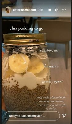 a jar filled with chia pudding sitting on top of a table