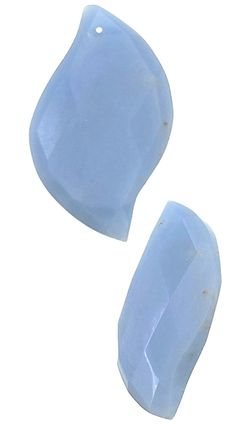 two light blue glass pieces on a white background