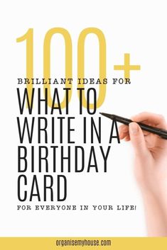 a hand holding a pen with the words 100 + what to write in a birthday card for everyone in your life