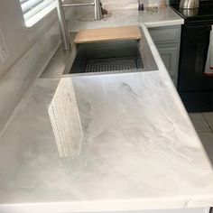 the kitchen counter is clean and ready to be used as a dishwasher or sink